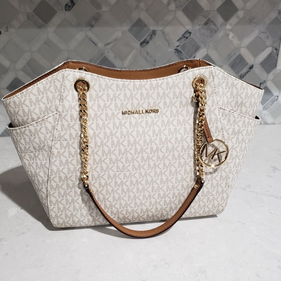 Michael Kors Handbags - Michael Kors Jet Set Travel Bag w/Gold Accents